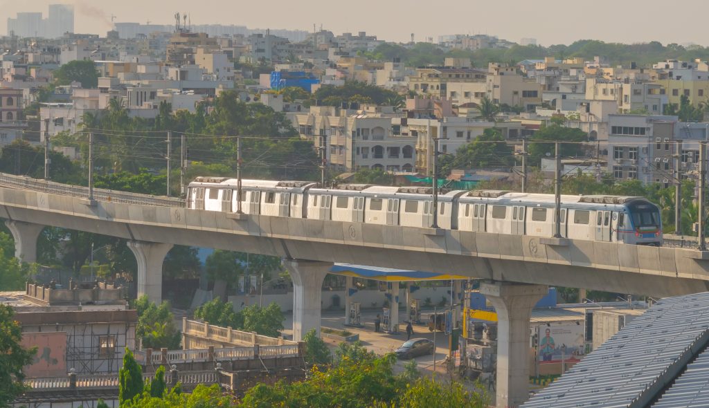 Hyderabad Metro Rail train arriving at a station platform