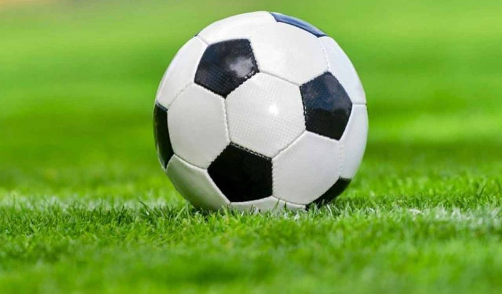 Football players in action during the Bolarum Challenge Cup match between AGORC and Skykings FC in Hyderabad.
