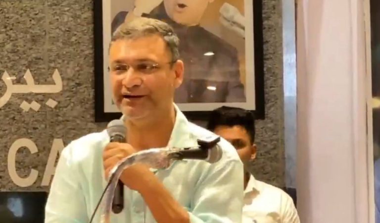 Akbaruddin Owaisi addressing a crowd, gesturing emphatically