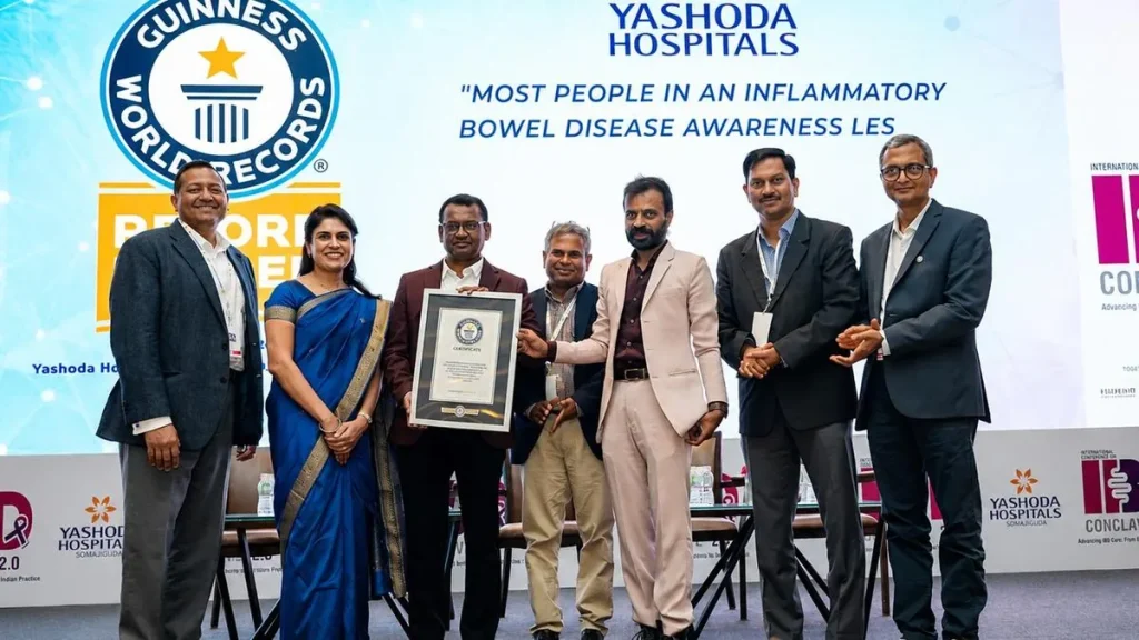 Dr. Kiran Peddi and Dr. S. Prashanth Reddy of Yashoda Hospitals receiving the Guinness World Record certificate from adjudicator Rishi Nath