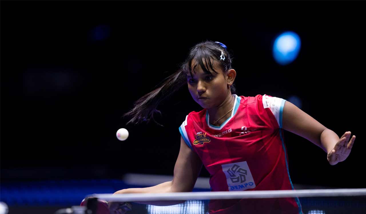 Table tennis players competing during an Ultimate Table Tennis match in India