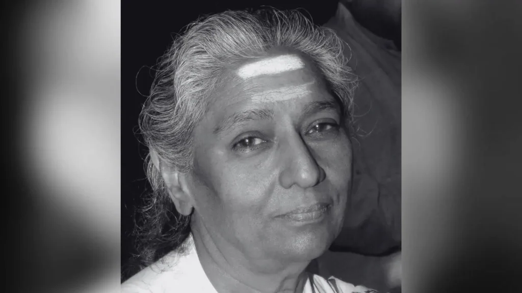 Portrait of veteran playback singer S Janaki performing