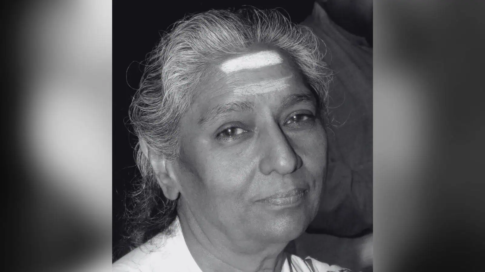 Portrait of veteran playback singer S Janaki performing