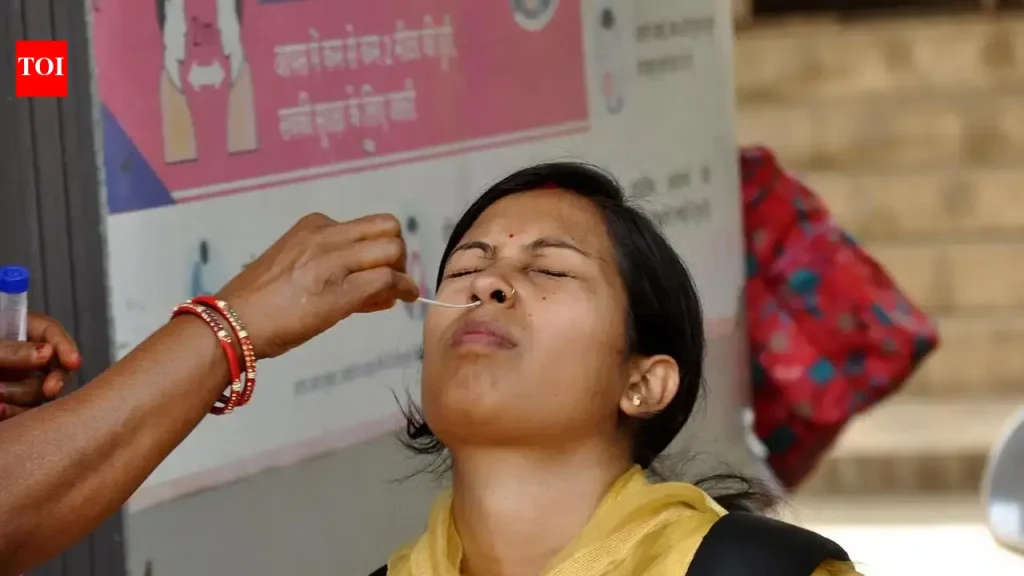 Patients waiting for RT-PCR tests outside a hospital in Hyderabad