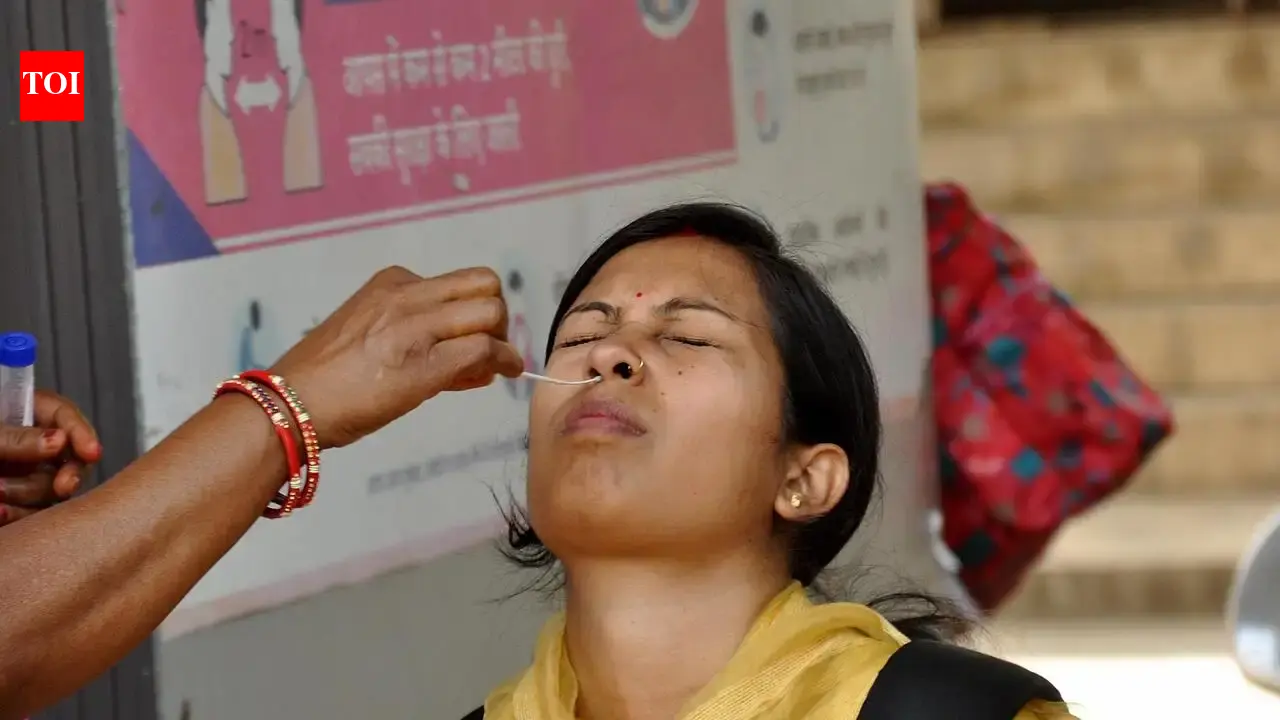 Patients waiting for RT-PCR tests outside a hospital in Hyderabad