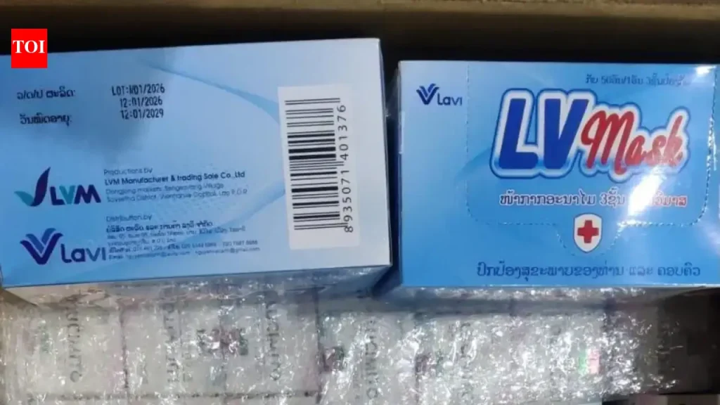 Hyderabad Customs officers examining boxes of seized anti-cancer medication