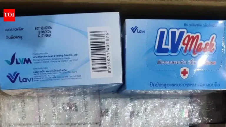 Hyderabad Customs officers examining boxes of seized anti-cancer medication