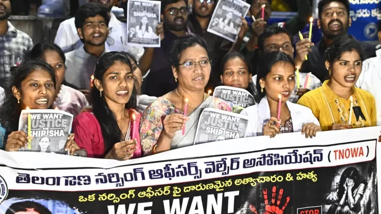 Members of the Telangana Nurses Association holding a candlelight vigil at Ambedkar Statue, Liberty, in Hyderabad on Monday night